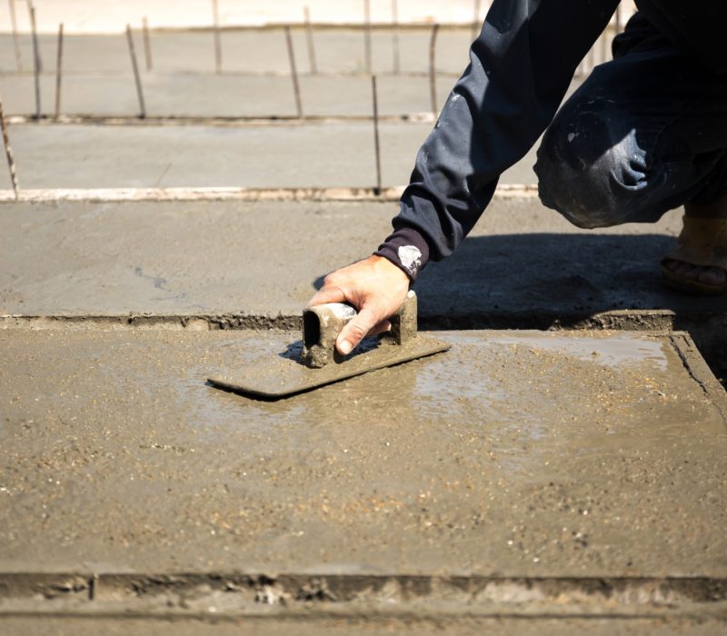 worker-hand-using-steel-trowel-making-concrete-flo-2026-03-26-06-15-10-utc (Large)